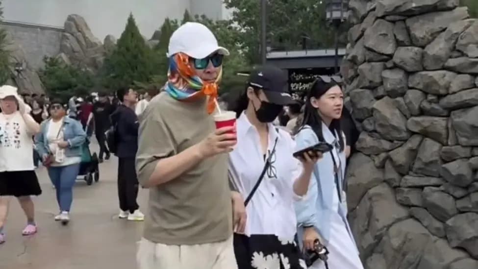 陈建斌蒋勤勤环球偶遇装扮争议：姨味丝巾和孕味步伐是否被回应