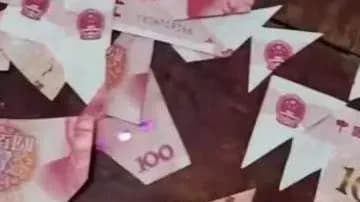 老人剪碎146张百元钞票四问：残钞真能自己拼回来吗